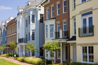 Multicolored Painted Brick Townhouses In A Row