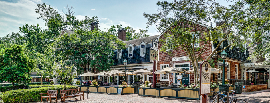 Cobblestone street and side walk with colonial style buindings